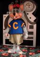 Chuck E. Cheese mascot in a blue shirt and shorts, ready for fun at a family-friendly arcade and pizza restaurant.