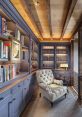 Cozy home library corner featuring elegant bookshelves, a tufted chair, and warm wooden beams for a serene reading nook.