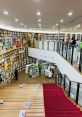 Modern Metropolitan Library interior featuring shelves of books, cozy reading spaces, and an inviting staircase.