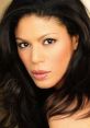 Merle Dandridge as Alyx Vance, showcasing her captivating gaze and elegant features with flowing dark hair.