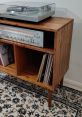 Record player Library The of a record player clicking and starting a record is a nostalgic reminder of a bygone era. The