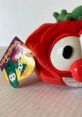 Plush Bob the Tomato toy with large eyes and tag featuring VeggieTales characters, perfect for collectors and fans.