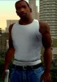 Carl Johnson from GTA San Andreas, wearing a white tank top and blue jeans, stands confidently in an urban setting.