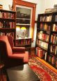 Cozy reading nook in a home library, featuring shelves of books, an armchair, and a warm lamp for comfortable reading.