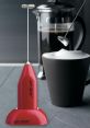 Milk frother Library The of a milk frother in action is a symphony of steaming and hissing as it works its magic to