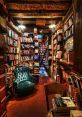 Cozy interior of Shakes Library featuring bookshelves, a vintage chair, and a rustic atmosphere for book lovers.