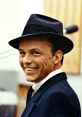 Frank Sinatra smiling in a classic suit and fedora, capturing the essence of vintage Hollywood charisma.