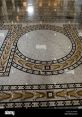 Tile floor Library The library floor was made of smooth tiles, creating a steady and rhythmic pattern of as people walked