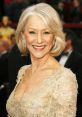 Helen Mirren shines on the red carpet, showcasing elegance in a sparkling gown at a prestigious awards ceremony.