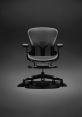 Herman Miller Aeron Library The distinctive of a Herman Miller Aeron chair rolling on a wood vinyl floor fills the quiet