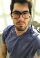 Germán Garmendia wearing glasses in a casual setting, showcasing his signature style and charisma in a selfie.