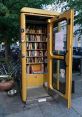 Wall phone Library The library was filled with the familiar of an old wall phone ringing in the distance, the rotary dial