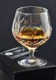 Brandy glass Library The resonant of a crystal glass clinking against another fills the air in Brandy Glass's library, a