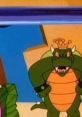 King Koopa from Super Mario World, voiced by Harvey Atkin, showcasing his iconic green dragon-like appearance.