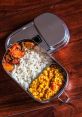 Indian Tiffin Library The first that resonates through the Indian Tiffin's Library is that of the Takeout Container. The