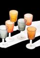 Drinking glasses Library The delicate clinking of glass meeting glass fills the air of the quiet library. The of