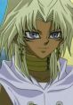 Marik Ishtar with spiky blonde hair and piercing blue eyes, showcasing his iconic look from Yu-Gi-Oh! series.