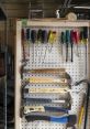 Variety of hand tools and screwdrivers organized on a pegboard in a Multi-Tool Library for DIY and repair projects.