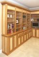 Elegant wooden bookshelf with cabinets and open shelving, perfect for a stylish kitchen door library setup.