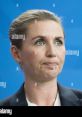 Mette Frederiksen, Denmark's Prime Minister, speaks during a press conference, showcasing her leadership and determination.