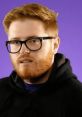 PaymoneyWubby, featuring Dennis Richardson, with a vibrant purple background and signature red beard and glasses.