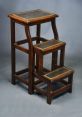 Stool dragging Library The first is a deep and resonant thud as a wooden stool is dragged across the floor. The is both