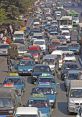 Traffic Jam Library The cacophony of that fill the air in a traffic jam in Manila is a symphony of chaos. The roar of