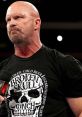 Stone Cold Steve Austin giving a passionate promo, wearing a Broken Skull Ranch tee, showcasing his iconic wrestling persona.