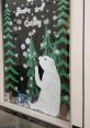 Wintry library display featuring a polar bear and trees, promoting a cozy reading atmosphere with the phrase, "Books are Calling.