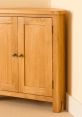 Stylish wooden cupboard with double doors, perfect for storage and enhancing home decor in any room.