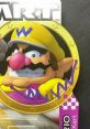 Wario from Super Mario Kart featured with a signature, showcasing the iconic character by Charles Martinet.