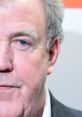 Close-up of Jeremy Clarkson's face, highlighting his distinct features and expressive eyes, reflecting his charismatic personality.