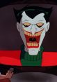 The Joker, voiced by Mark Hamill, grinning menacingly in classic animated style, showcasing his iconic villainous look.