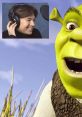 Mike Myers recording voice for Shrek, showcasing the character's iconic smile and animated charm in a vibrant setting.