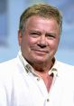 William Shatner smiles at a public event, showcasing his iconic presence as a legendary actor and pop culture icon.