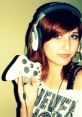 Gamer girl with Xbox controller and headset, ready for immersive gaming experiences and online play.