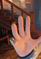 Elizabeth from BioShock stretches her hand, showcasing her iconic thumb with a thimble in a detailed interior setting.