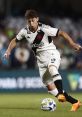 Andrey Matias showcasing skillful footwork during a football match while playing for Vasco da Gama, wearing team jersey.