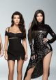 Kourtney Kardashian and Kylie Jenner pose stylishly in chic outfits showcasing their iconic fashion sense and beauty.