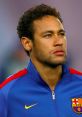 Neymar focused and ready, wearing a Barcelona jersey, showcasing his determination before a match.