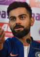 Virat Kohli speaking passionately at a press conference, showcasing his leadership and charisma in cricket.