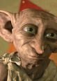 Close-up of Dobby the house-elf, showcasing his large ears, expressive eyes, and distinct facial features.