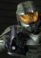 Master Chief from Halo, armed and ready, showcasing iconic armor and firearm in a dramatic pose.