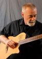 Paul Elwood You can play and download these here: The gentle strumming of a guitar fills the air, creating a melodic and