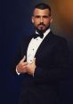 Stylish man in a tuxedo with a bow tie, exuding confidence and elegance, perfect for formal occasions.