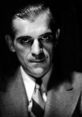 Boris Karloff in classic black and white portrait, exuding a mysterious and captivating presence. Iconic horror actor.