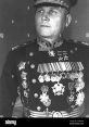 Soviet military leader in formal uniform adorned with medals and decorations, highlighting achievements of Ivan S.