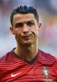 Cristiano Ronaldo wearing a Portugal jersey, displaying determination and focus during a football match.