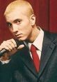 Eminem in a suit with a microphone, showcasing a powerful expression from the Eminem Show era. Iconic hip-hop moment.