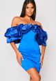 Elegant blue off-the-shoulder dress with dramatic ruffled sleeves, perfect for stylish occasions and MissG fashion.